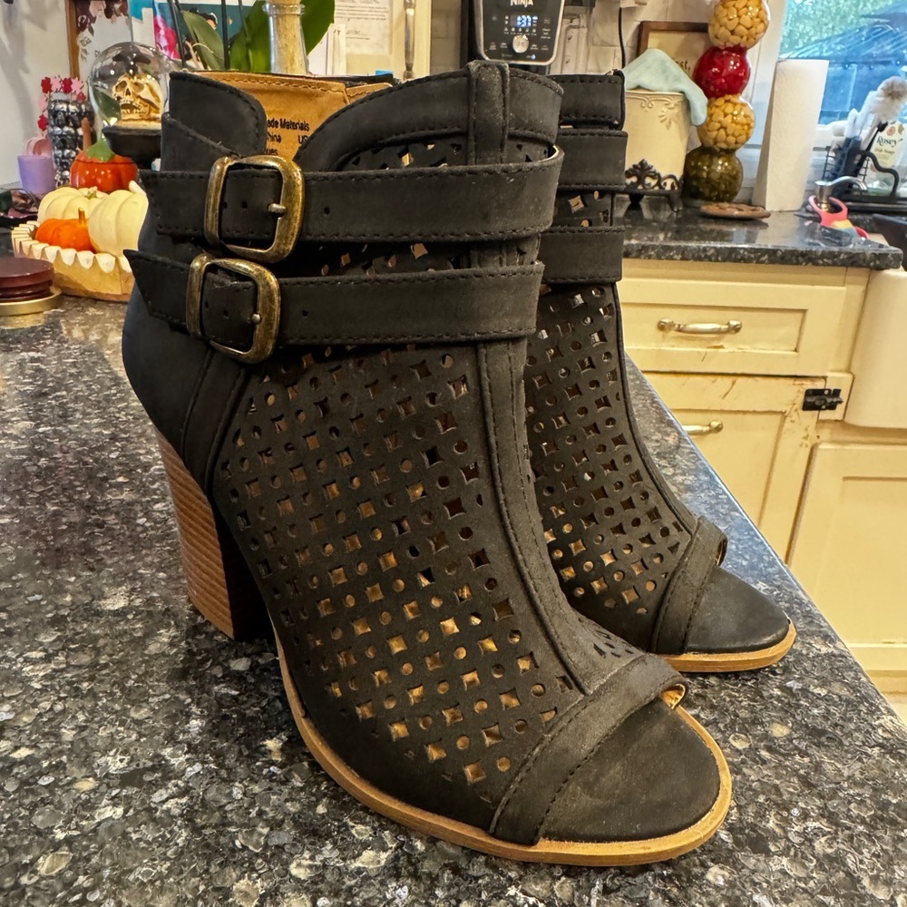 Brash Black Cut-Out Heeled Boots